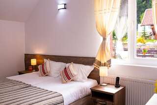 Отель Hotel Floare de Colt Мэнэстиря-Гуморулуй Двухместный номер с 2 отдельными кроватями-16